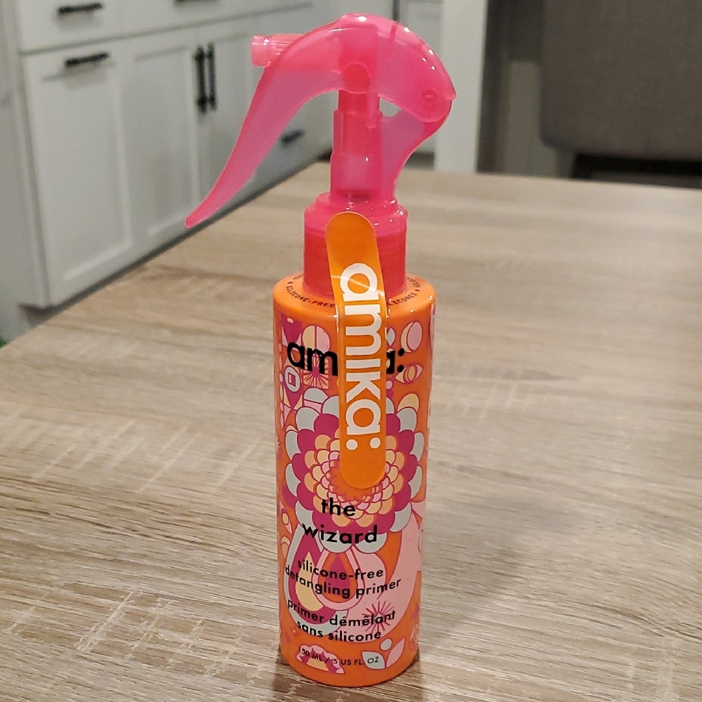 Amika The Wizard Detangling Primer in Pink and Orange
